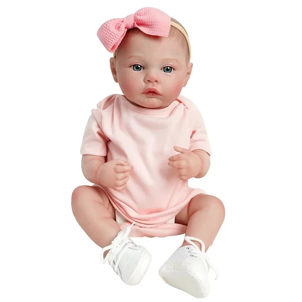 Boneca Bebê Reborn realista com macacão rosa Brastoy