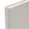 Caixa livro decorativa com revestimento em linho bege Mart 24,5x31