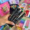 Canetinhas para colorir com ponta dupla e estojo preto 24 cores
