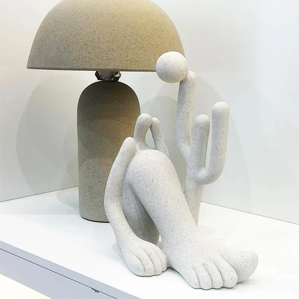Escultura em poliresina Abaporu Tarsila do Amaral off white Mart 27x32