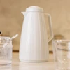 Garrafa térmica Carrossel branca com detalhes dourados Wolff 400 ml
