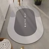Tapete oval absorvente e antiderrapante para banheiro 38x58