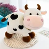 Vaca fofinha de pelúcia com ventosa para pendurar 27 cm