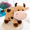 Vaca fofinha de pelúcia com ventosa para pendurar 27 cm