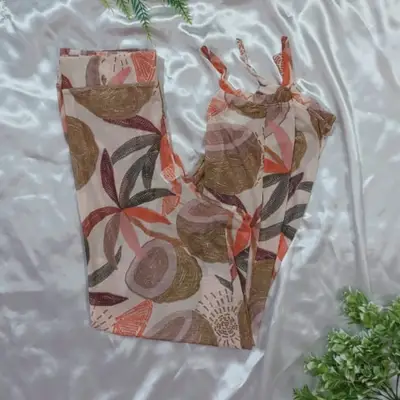 CALÇA SAÍDA DE PRAIA ESTAMPADA COM TRANSPARÊNCIA