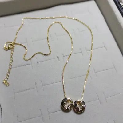 COLAR DOIS MENINOS VAZADOS COM ZIRCÔNIA CRISTAL BANHO OURO 18K