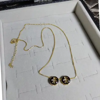 COLAR DOIS MENINOS VAZADOS COM ZIRCÔNIA CRISTAL BANHO OURO 18K
