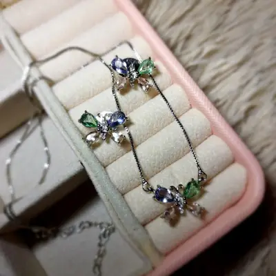 CONJUNTO BOBOLETAS COM PEDRAS BANHO PRATA