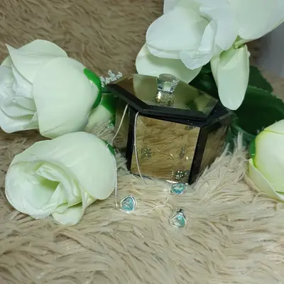 CONJUNTO CORAÇÃO ZIRCONIA ENVOLTO VAZADO VERDE AGUA BANHO PRATA 999